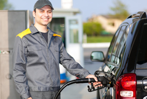 man working at the gas station